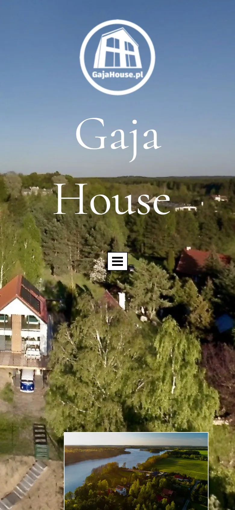 Stara strona GajaHouse z kreatora: zdjęcie z drona, duże logo i menu, bez informacji o domu i rezerwacji